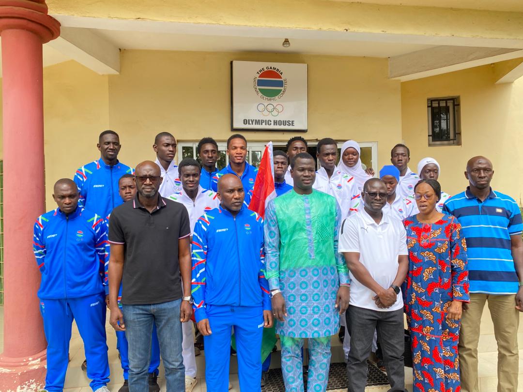 Minister Badjie handover battle flag to Team Gambia